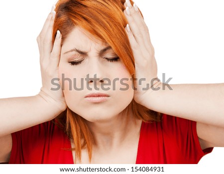 stressed woman holding her head with hand