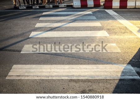 crosswalk on the road for safety. Safety concept.