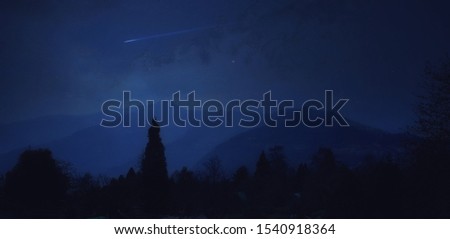 view of hills in the night