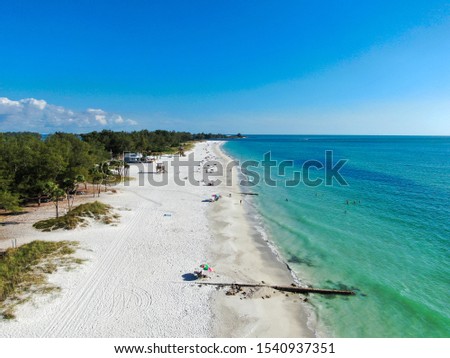 Aerial view of Anna Maria Island, white sand beaches and blue water, barrier island on Florida Gulf Coast. Manatee County. USA