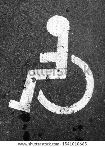 Wheelchair symbol on the road