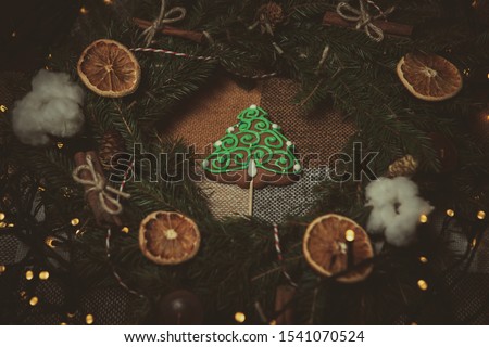 Hand made new year 2019 decor and home baked Christmas tree cookie in close up
