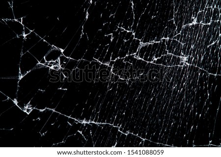 cracked glass isolated on a black background. broken 