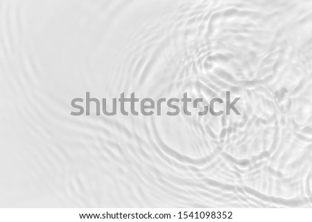 Water waves on the pool. Abstract background. Black and white concept. Royalty-Free Stock Photo #1541098352