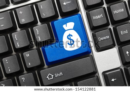 Close up view on conceptual keyboard - Bag of dollars (blue key)