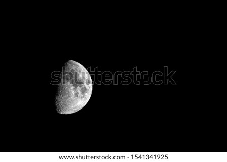 Half moon in the darkness
