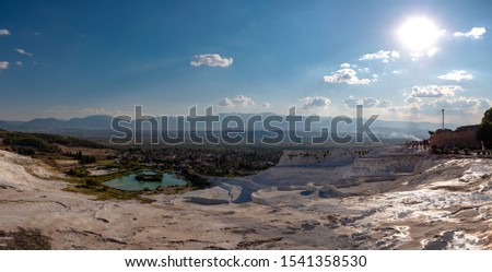 Pamukkale mineral-rich thermal waters flowing down white travertine terraces, Turkey 
