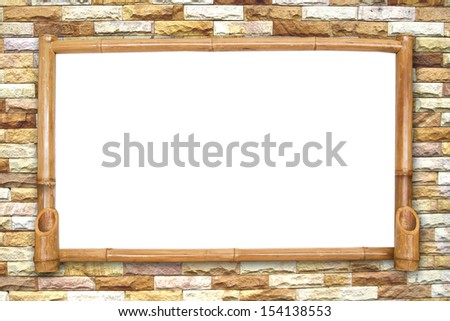 bamboo board on red brick wall background.