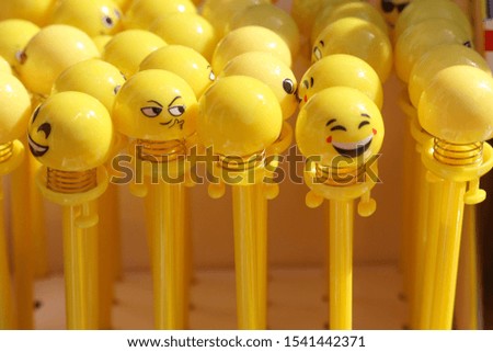 Yellow Colored Smiley Top Cover Cap of Pens for Writing