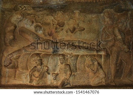 "Ananthashayana (Lord Vishnu sleeping on the the celestial snake Anantha) relief on the inner south wall of Mahishasuramardhini cave temple in Mahabalipuram, Tamilnadu, South India"