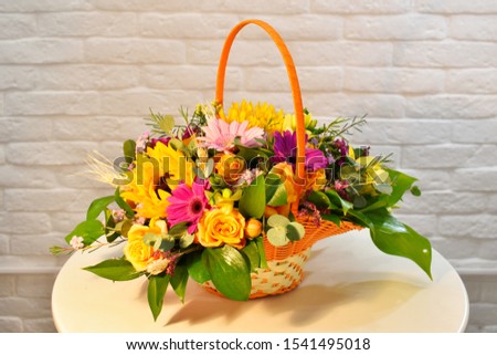 Floral color composition. Blooming flowers on the table. Bouquet for a woman. Decoration with flowers.
