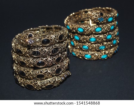 Photo of the luxury bracelets isolated on a dark background