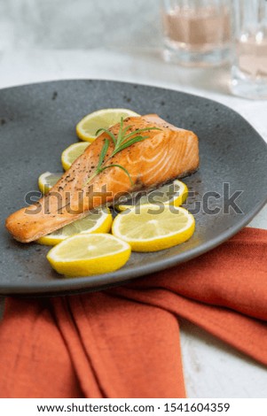 Grilled salmon with lemons front shot 