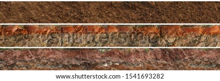 layered soil geology cross section underground earth, cutaway earth ground terrain surface Royalty-Free Stock Photo #1541693282