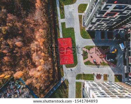 Ariel view basketball court in the yard of an apartment building. Russia, Saint Petersburg.