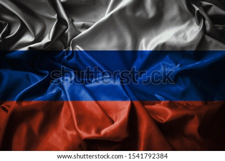 Russia Flag Background. Tricolor of white, blue and red. Image shows Three Horizontal Equal Bands, highly detailed silk texture, shadows and shiny points. World Flags Concept