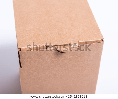 Brown craft cardboard box clasp, clip, closed lock