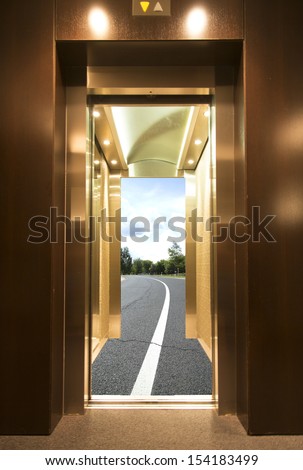 open elevator door with road to the horizon