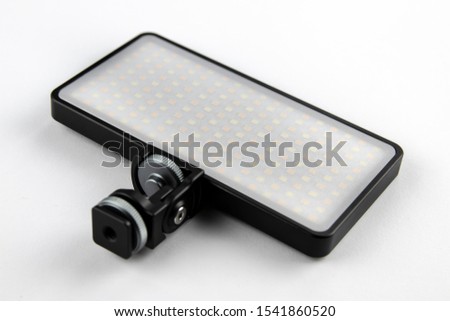 The picture shows a small led lamp to be mounted on dslr.