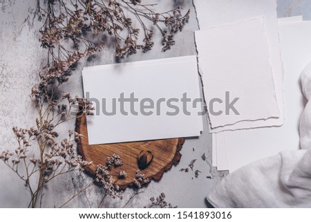 Festive wedding, birthday table setting cards with cross-section of a tree, dry branches. Blank card mockup. Restaurant menu concept. Flat lay, top view