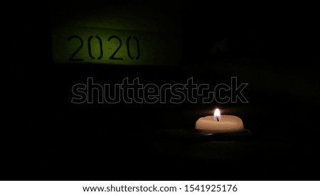 Candle lighting a new year