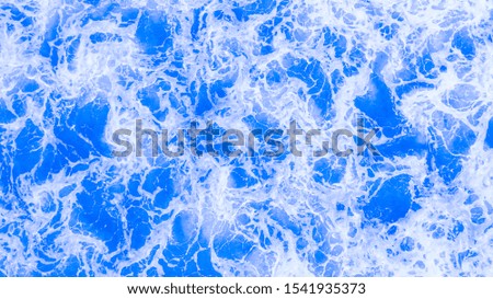 Aerial top view background shot of aqua sea water surface, Sea surface texture background.