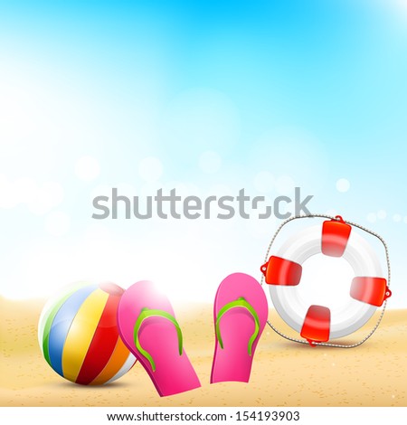 Beach with flip-flops, beach ball and safety circle