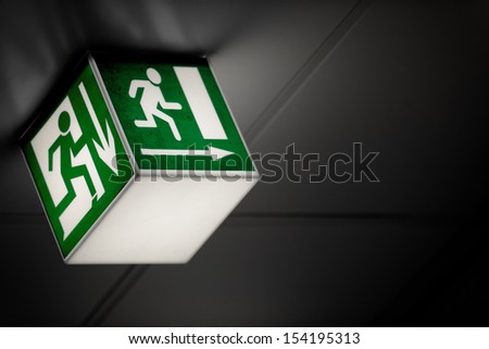 Exit sign on the wall in a building