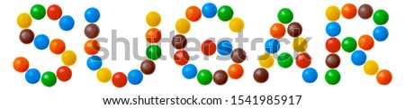 Word sugar made of colored sweets isolated on a white background.