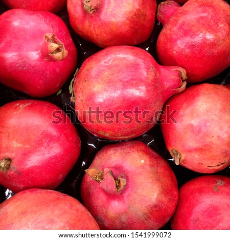 Macro photo pomegranate fruits.  Stock photo red fresh pomegranate fruit