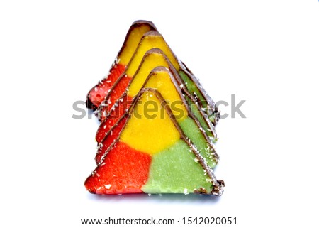 triangle shaped colorful homemade vegetarian sweets image