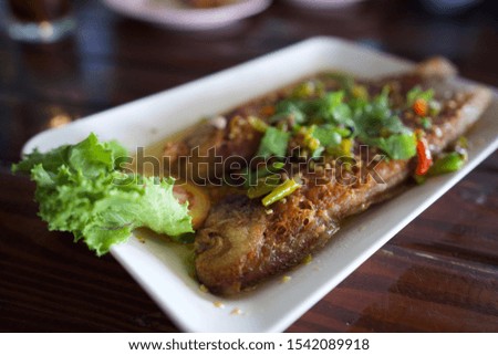 Fried halibut fish with sweet chilli sauce.