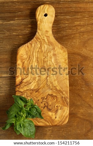 kitchen cutting board on a wooden background