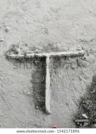 Letter T, Single letter made with concrete 