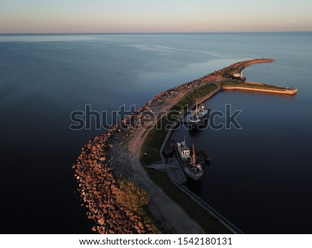 Aerial photography at sunset. The shore of Lake Ladoga is amazing at sunset. 