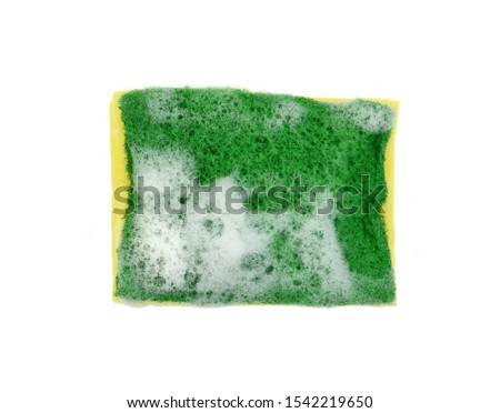 Dishwashing sponge with foam isolate on  white background. Yellow soapy sponge with foam on white background. 