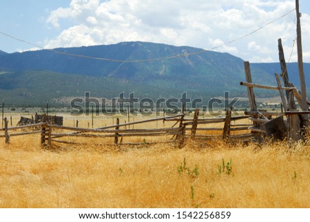 Tumbling down old wooden fences in rural southern Utah. Southwestern landscape  photography.