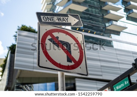 no turn left sign, one way downtown miami