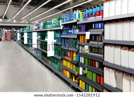 Water bottles on shelf in supermarket suitable for presenting new water bottles and packaging among many others. Royalty-Free Stock Photo #1542281912