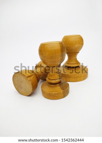 Wooden rubber stamps isolated on white background.