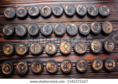 Set of anglo-saxon runes carved in wood - anglo-saxon futhark (futhorc) Royalty-Free Stock Photo #1542371627