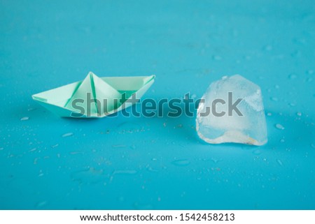 Ship among icebergs. Danger for business concept