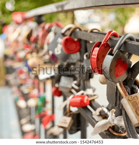 Love locks on the bridge. Padlocks close up view.