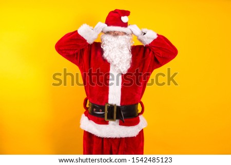 Santa Claus hates Christmas in yellow background