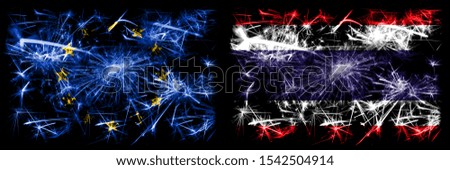 Eu, European union vs Thailand, Thai new year celebration sparkling fireworks flags concept background. Combination of two states flags.

