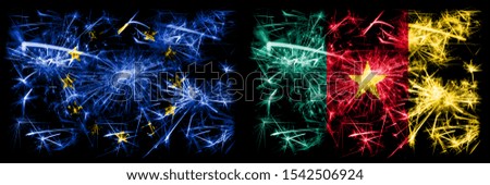 Eu, European union vs Cameroon, Cameroonian new year celebration sparkling fireworks flags concept background. Combination of two states flags.
