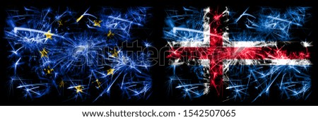 Eu, European union vs Iceland, Icelandic new year celebration sparkling fireworks flags concept background. Combination of two states flags.
