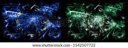 Eu, European union vs Arab League new year celebration sparkling fireworks flags concept background. Combination of two states flags.
