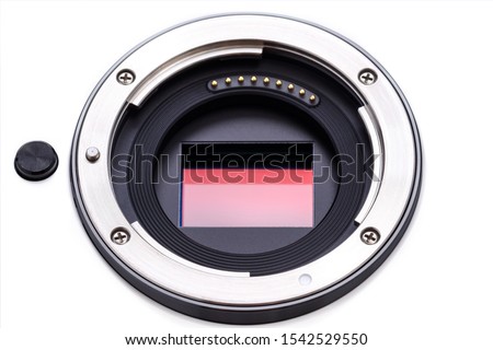 digital camera lens mount, camera sensor and lens contact ready to be cleaned Royalty-Free Stock Photo #1542529550
