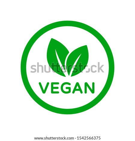 Vegan food diet icon. Organic, bio, eco symbol. Vegan, no meat, lactose free, healthy, fresh and nonviolent food. Round green vector illustration with leaves for stickers, labels and logos Royalty-Free Stock Photo #1542566375